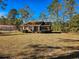 Brick ranch house with a covered porch and spacious yard at 5253 Jefferies Hwy, Walterboro, SC 29488