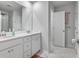 Bathroom with double vanity and marble-tiled floor at 530 Richfield Way, Summerville, SC 29486