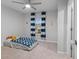 Bedroom with a twin-size bed and blue and white striped curtains at 530 Richfield Way, Summerville, SC 29486