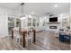 Bright dining area with farmhouse table and access to backyard at 530 Richfield Way, Summerville, SC 29486