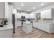 Modern kitchen with white cabinets, stainless steel appliances, and an island at 530 Richfield Way, Summerville, SC 29486