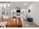 Open living room with a fireplace, built-in shelving and comfortable seating at 530 Richfield Way, Summerville, SC 29486