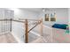 Loft with carpeted floor, plenty of light, and a view of the lower level at 530 Richfield Way, Summerville, SC 29486