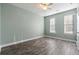 Bright bedroom with wood-look floors and ceiling fan at 546 Four Seasons Blvd, Summerville, SC 29486