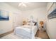 Bright bedroom featuring a white bed frame and decor at 669 Heyward Ln, Moncks Corner, SC 29461