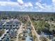 Aerial view of a neighborhood with houses and tree-lined streets at 703 N Hickory St, Summerville, SC 29483