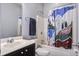 Bathroom with shower/tub combo and colorful curtain at 705 Quintan St, Summerville, SC 29486