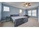 Spacious bedroom with ceiling fan and blue walls at 705 Quintan St, Summerville, SC 29486