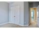 Bedroom with double door closet and grey walls at 705 Quintan St, Summerville, SC 29486