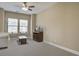 Spacious bonus room with neutral walls, carpet, and large windows at 705 Quintan St, Summerville, SC 29486