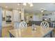 Kitchen breakfast nook with table and chairs, view of living room at 705 Quintan St, Summerville, SC 29486