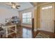 Home office with hardwood floors, desk, and built-in shelving at 705 Quintan St, Summerville, SC 29486