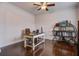 Home office with hardwood floors, a desk, and a ceiling fan at 705 Quintan St, Summerville, SC 29486