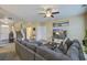 Living room with sectional sofa, large TV, and carpeted floors at 705 Quintan St, Summerville, SC 29486