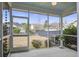 Spacious screened porch overlooking backyard with ceiling fan at 705 Quintan St, Summerville, SC 29486