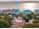 Aerial view of beach homes with ocean views at 904 E Arctic Ave, Folly Beach, SC 29439