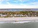 Aerial view of beachfront homes and community at 904 E Arctic Ave, Folly Beach, SC 29439