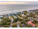 Aerial of beachfront homes and community at 904 E Arctic Ave, Folly Beach, SC 29439