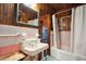 Bathroom with pink tile and vintage sink at 904 E Arctic Ave, Folly Beach, SC 29439