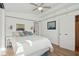 Bedroom with a queen-size bed, hardwood floors, and nautical decor at 904 E Arctic Ave, Folly Beach, SC 29439