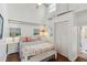 Charming bedroom with a queen bed and nautical decor at 904 E Arctic Ave, Folly Beach, SC 29439
