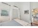 Bedroom with a queen bed and access to a porch at 904 E Arctic Ave, Folly Beach, SC 29439