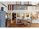 Rustic dining table with adjacent kitchen and laundry area at 904 E Arctic Ave, Folly Beach, SC 29439