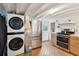 Stackable washer and dryer in a laundry room at 904 E Arctic Ave, Folly Beach, SC 29439