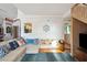 Coastal-themed living room with a comfy couch and nautical decor at 904 E Arctic Ave, Folly Beach, SC 29439