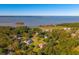 Aerial view of waterfront property with houses and trees at 927 Fishburne Rd, Pinopolis, SC 29469