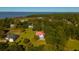 Waterfront property showcasing a white house and surrounding homes at 927 Fishburne Rd, Pinopolis, SC 29469