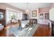 Formal dining room featuring hardwood floors, a bay window, and a crystal chandelier at 927 Fishburne Rd, Pinopolis, SC 29469