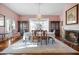 Formal dining room with hardwood floors, a chandelier, and built-in china cabinets at 927 Fishburne Rd, Pinopolis, SC 29469