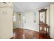 Spacious entryway with hardwood floors and antique furniture at 927 Fishburne Rd, Pinopolis, SC 29469