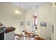 Upstairs hallway with hardwood floors and access to bedrooms at 927 Fishburne Rd, Pinopolis, SC 29469