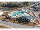Community pool with lounge chairs, cabanas, and a clubhouse at 9702 Roseberry St, Ladson, SC 29456