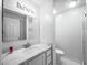 Clean bathroom with a quartz vanity top and shower at 1101 Reserve Way, Summerville, SC 29485
