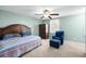 Spacious bedroom with a king-size bed and sitting area at 1101 Reserve Way, Summerville, SC 29485
