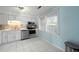 White cabinets, stainless steel appliances, and light blue walls at 1101 Reserve Way, Summerville, SC 29485