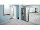 Stainless steel appliances and white cabinetry in kitchen at 1101 Reserve Way, Summerville, SC 29485