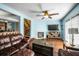 Living room with hardwood floors, fireplace, and access to upper level at 1101 Reserve Way, Summerville, SC 29485