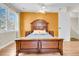 Bedroom with wood bed frame and orange accent wall at 114 Boone Dr, Summerville, SC 29485