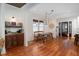 Charming dining area with hardwood floors and a rustic wooden table at 1153 King St, Charleston, SC 29403