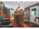 Home bar with vintage decor and a rustic wooden bar top at 1159 Wyndham Rd, Charleston, SC 29412