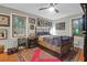 Spacious bedroom with a metal bed frame and wood floors at 1159 Wyndham Rd, Charleston, SC 29412
