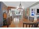 Dining room with a large copper table and kitchen view at 1159 Wyndham Rd, Charleston, SC 29412