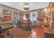 Home office features wood floors, collectibles, and ample desk space at 1159 Wyndham Rd, Charleston, SC 29412