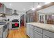 Gray kitchen with stainless steel appliances and island at 1159 Wyndham Rd, Charleston, SC 29412