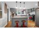 Modern kitchen with gray cabinets and an island at 1159 Wyndham Rd, Charleston, SC 29412