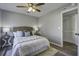 Cozy bedroom with a queen bed and wood-look floors at 117 Hummingbird Ave, Ladson, SC 29456